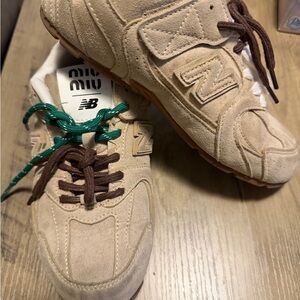New Balance Beige Sneakers with Brown and Green Accents